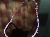 Colar rosa e roxo